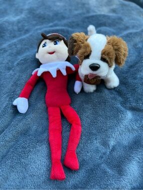 Elf (girl) and saint Bernard dog from elf  on the shelf stuffed